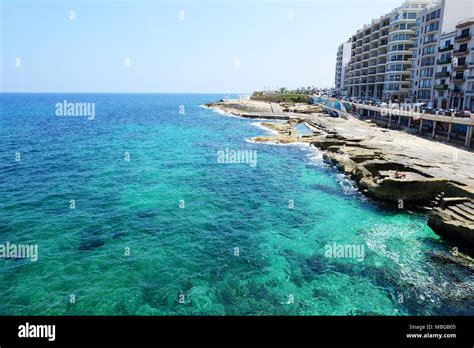 The view on beach and seafront, Malta Stock Photo - Alamy