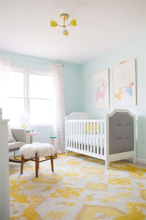 Yellow is another traditionally gender neutral color, but this nursery on Lay Baby Lay is ...