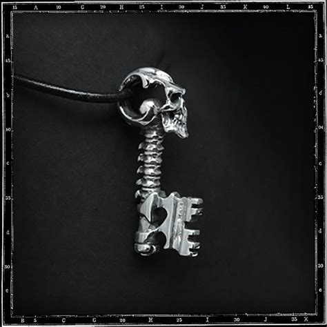 Skull key pendant