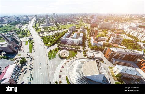 Aerial city view with roads, houses and buildings Stock Photo - Alamy