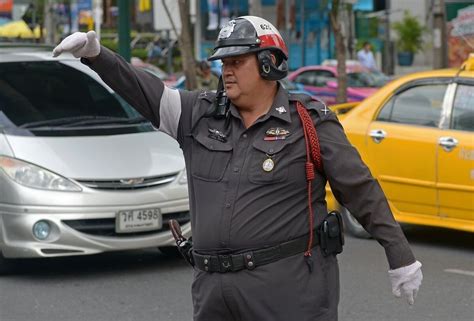Thailand Police Get Hello Kitty Armbands As Badge Of Shame | HuffPost News