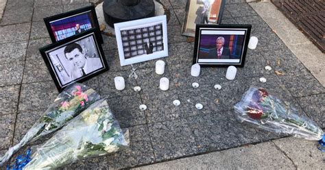 People in Toronto pay tribute to Alex Trebek with memorial on King Street