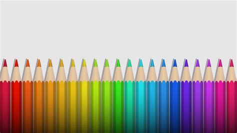 Premium Vector | Rainbow colored pencils lie in a row on a white background