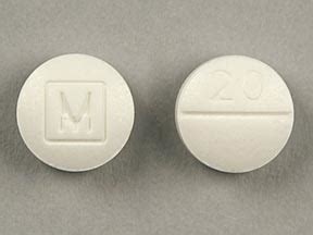 Round White Pill With Circle M - MedsChat