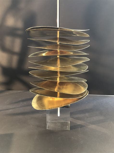 Robert Lee Morris Stacked Brass Disc Sculpture | Robert Lee Morris Gallery