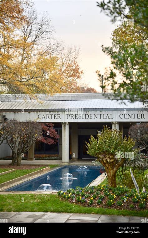 Entranceway, with fountain in autumn at sunset, to Jimmy Carter Presidential Library & Museum ...