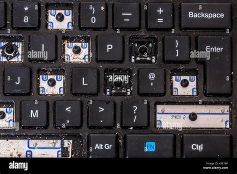 Broken Computer keyboard with keys missing Stock Photo - Alamy