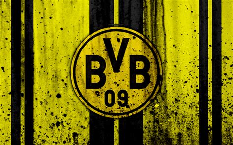 a black and yellow striped wall with the word bvb on it