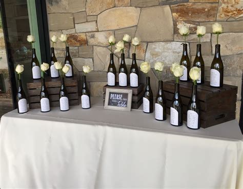 Wine bottles as a seating chart | Seating chart wedding, Diy seating, Seating charts