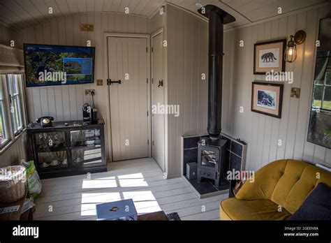 Interior view of an interior of the small cabin in a field by the forest Stock Photo - Alamy