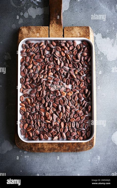 Roasting cocoa beans Stock Photo - Alamy