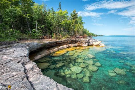 Pristine waters in a rocky Lake Superior Cove | Michigan vacations, Michigan travel, Michigan ...