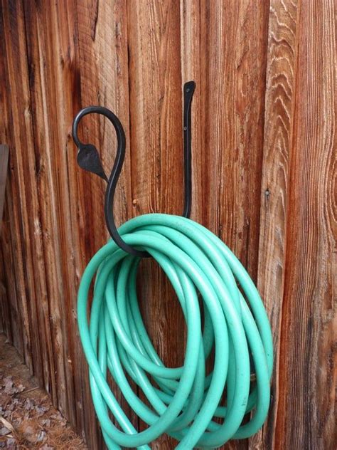 Hose Holder Hand Forged Wall Garden hose holder leaf end | Etsy | Hose holder, Garden hose ...