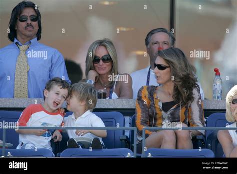 Steffi Graf watches her son, Jaden Gil, center, play with another child ...