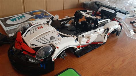 My school has this cool Lego Technic Porsche 911 RSR. It's been 3 days and the car is near ...