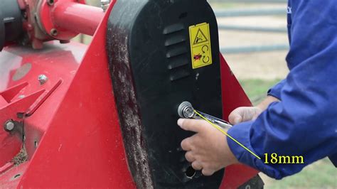 Tightening flail mower belts - YouTube