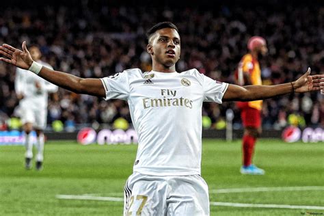 Rodrygo celebrating goal at stadium 2K wallpaper download