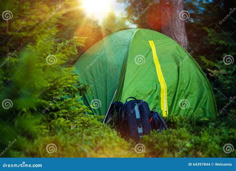 Tent Camping and Backpack stock photo. Image of meadow - 64397844