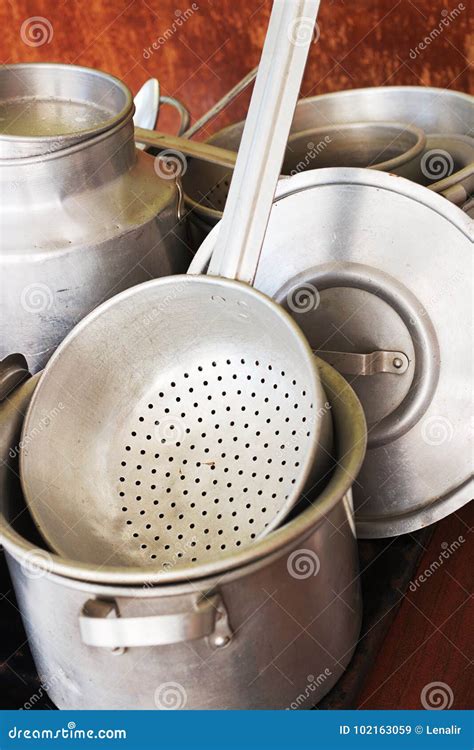 Aluminum kitchen utensils stock image. Image of saucepan - 102163059