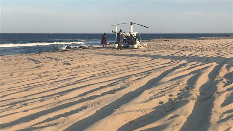 Helicopter makes an emergency landing on Long Branch beach