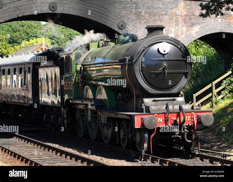 LNER B12 8572 steam locomotive in apple green livery pulls out of ...