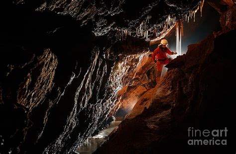 Cave Explorer Speleologist Exploring Photograph by Salajean | Fine Art ...