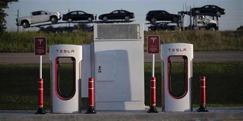 Tesla Looks to Open Its EV-Charging Network - WSJ