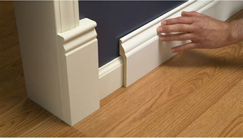 A Stroll Thru Life: Install Wide Baseboard Molding Over Existing Narrow Baseboard