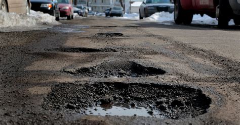 Pothole at I-94 and 10 Mile damages at least 5 vehicles