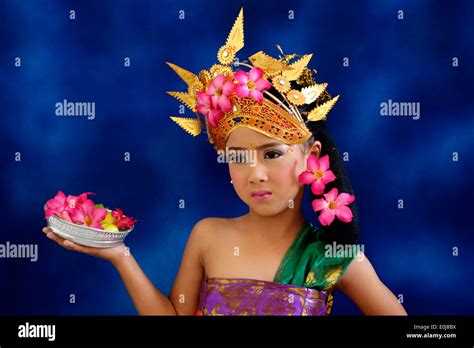 little girl poses in fancy dress at school to commemorate the indonesian woman hero hari kartini ...