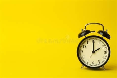 Time Background Concept. Vintage Classic Alarm Clock on Yellow Empty ...