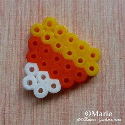 Make some tiny candy corn designs with fused perler beads for Halloween ...