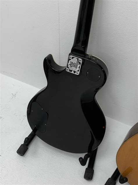 Hohner Arbor Series electric guitar in black and elm effect, serial no ...