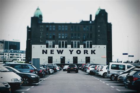 New York Hotel Building at Parking Lot · Free Stock Photo