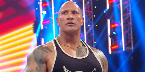 The Rock delivers ultimate mic drop moment involving Roman Reigns on ...