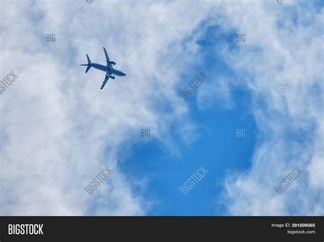 Plane Blue Sky Clouds Image & Photo (Free Trial) | Bigstock