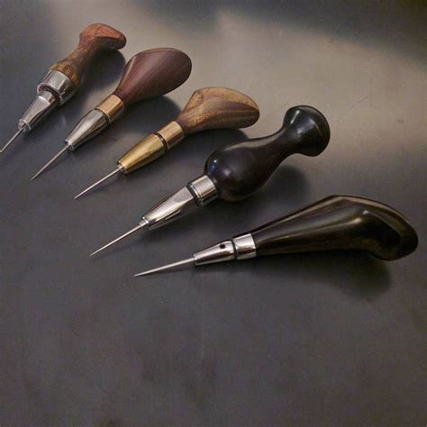 My current line-up of #leatherworking #awls. Latest is up front. All awls are machined and turn ...