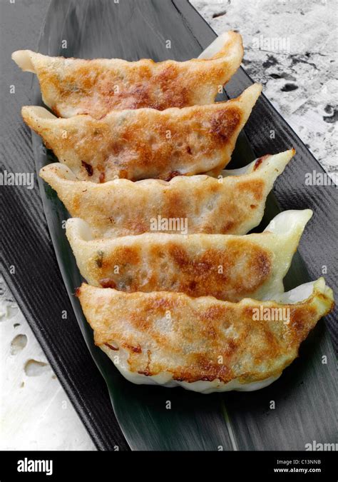 Pan fried gyoza Stock Photo - Alamy