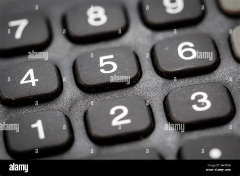 Keyboard and calculator Stock Photo - Alamy