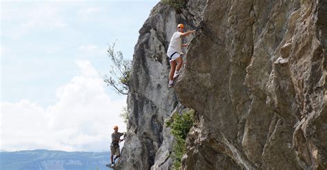 Men Climbing a Cliff · Free Stock Photo