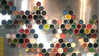 paint can wall | Paint cans and lights on a steel wall - Fee… | Flickr