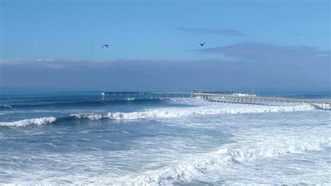 Huge surf hitting the OB Pier - YouTube