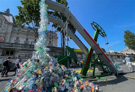 Giant plastic-spewing artwork unveiled for Paris talks against waste | The Star