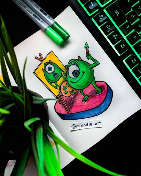 a drawing of two green monsters sitting on top of a table next to a ...