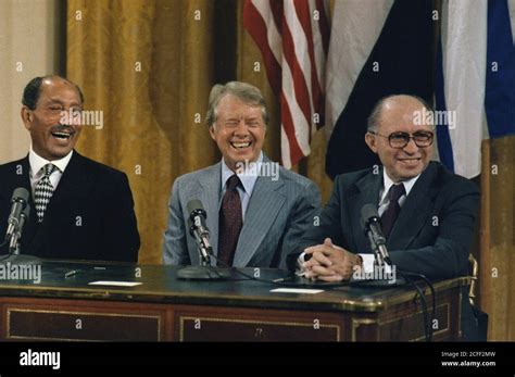 "Anwar Sadat, Jimmy Carter and Menahem Begin at the Camp David Accords Signing Ceremony. ca. 09 ...