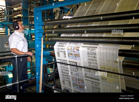 Newspaper being printed on a rotary printing press for the Houston ...