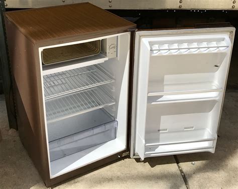 Uhuru Furniture & Collectibles: Mini Fridge by Sanyo - $65 SOLD