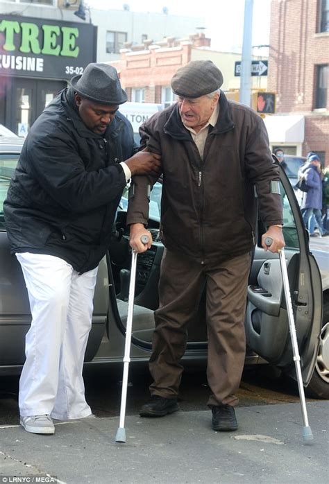 Robert De Niro looks older with all-white hair as he hobbles on ...