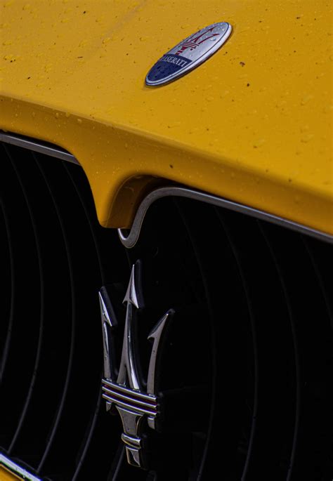 Download Maserati Trident Logo Wallpaper | Wallpapers.com