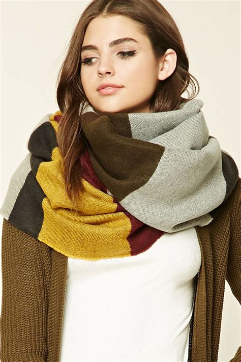 A woven oblong scarf featuring colorblocking and fringed trim. | Oblong ...